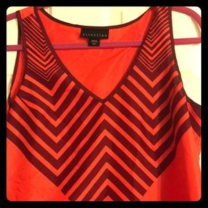 Size medium orange with maroon design tank.